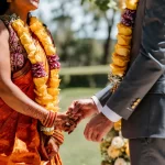 Bride and groom at a multicultural wedding ceremony